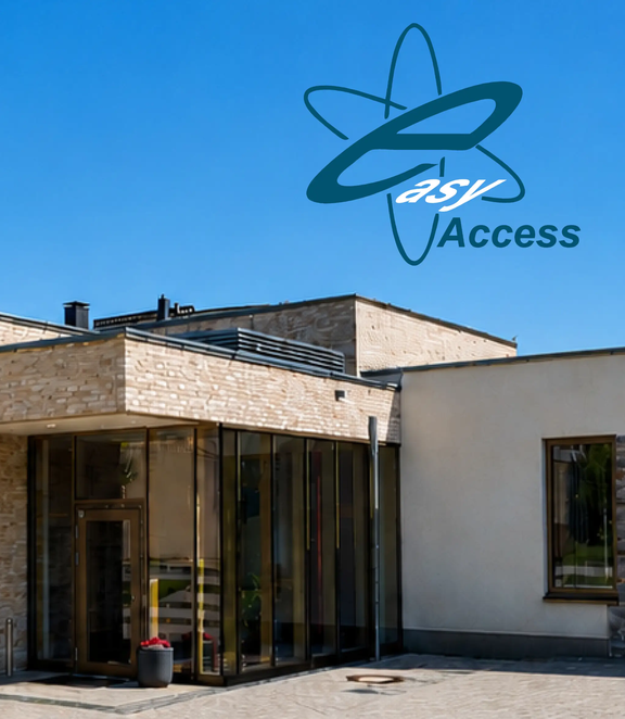 Projekt referencyjny WILKA Haus Marien: nowoczesne centrum kościelne i parafialne z przestronną szklaną fasadą, jasną architekturą z kamienia naturalnego oraz bezbarierowym wejściem.